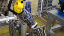 Robot de mise en caisse